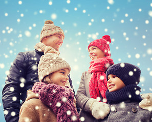 Image showing happy family in winter clothes outdoors