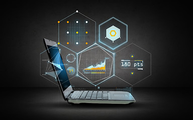 Image showing laptop computer with virtual chart projection