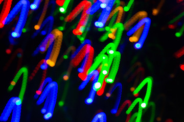 Image showing colorful bright night lights over black background