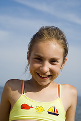 Image showing Happy girl portrait on the beach