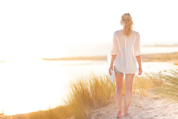 Image showing Free Happy Woman Enjoying Sun on Vacations.