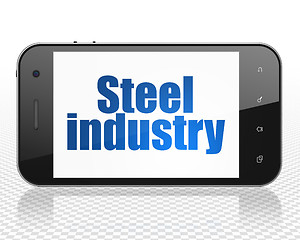 Image showing Manufacuring concept: Smartphone with Steel Industry on display