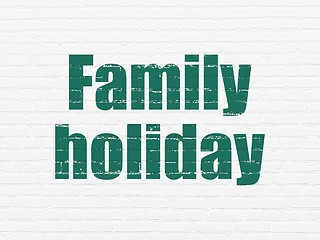 Image showing Vacation concept: Family Holiday on wall background