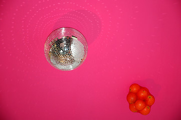 Image showing DISCO BALL AND ORANGES