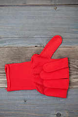 Image showing gloves with raised thumb up