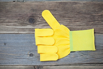 Image showing gloves with raised thumb up