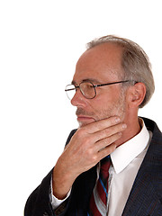 Image showing Middle age man with hand on chin.