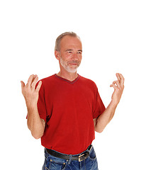 Image showing Middle age man with finger crossed.