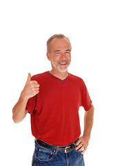 Image showing Middle age man with thump up.