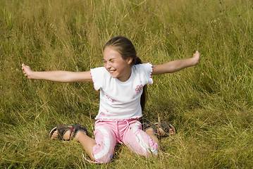 Image showing Girl plays on a meadow III