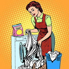 Image showing woman washes clothes washing machine