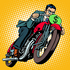 Image showing Businessman on a motorcycle. Financial success