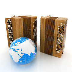 Image showing Musical instruments - retro bayans and Earth