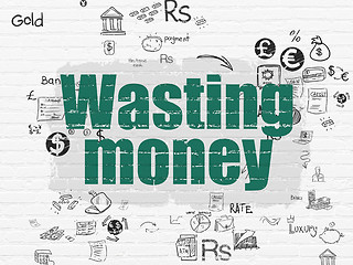 Image showing Money concept: Wasting Money on wall background