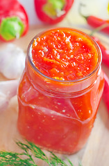 Image showing Fresh chilli sauce in the glass bank