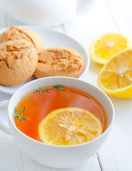 Image showing Fresh tea with lemon in the white cup