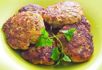 Image showing cutlets on the green plate