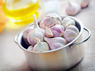 Image showing garlic in metal bowl on the table