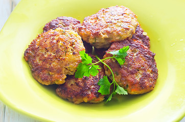 Image showing cutlets on the green plate