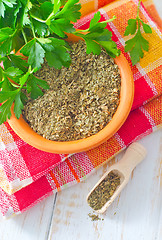 Image showing Dry parsley in the bowl, green parsley