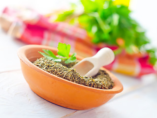 Image showing Dry parsley in the bowl, green parsley