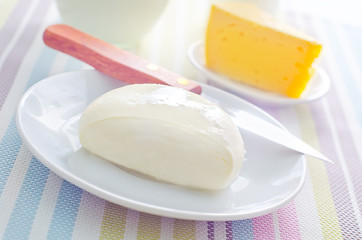 Image showing fresh cheese on the white plate