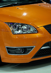 Image showing Front of orange car