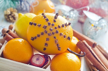 Image showing Fresh oranges and cinnamon for christmas