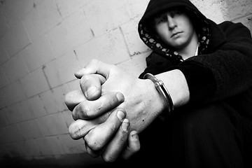 Image showing teen in handcuffs