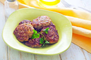 Image showing cutlets on the green plate