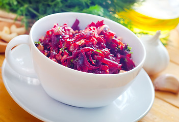 Image showing Fresh salad with beet and walnuts, vegetarian salad