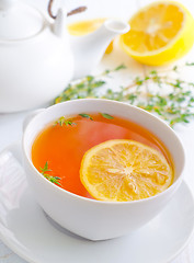 Image showing Fresh tea with lemon in the white cup