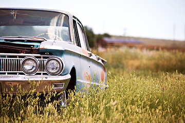 Image showing abandoned car in field