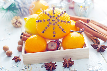 Image showing Fresh oranges and cinnamon for christmas