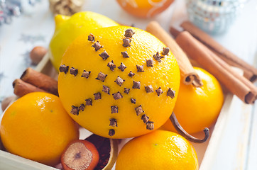 Image showing Fresh oranges and cinnamon for christmas