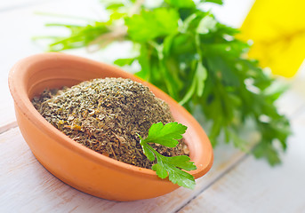 Image showing Dry parsley in the bowl, green parsley