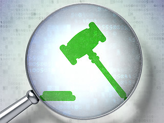 Image showing Law concept: Gavel with optical glass on digital background