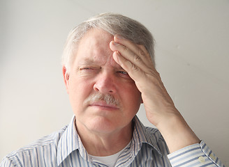 Image showing older man with head pain