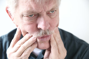 Image showing tooth or cheek pain in older man