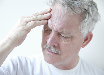 Image showing senior with headache