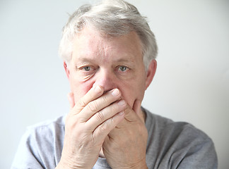 Image showing man worried about his bad breath