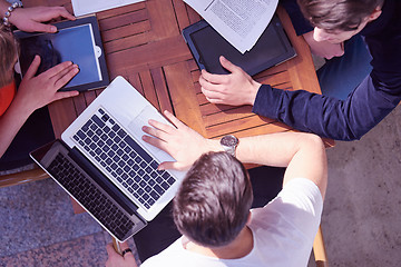 Image showing students group working on school  project  together