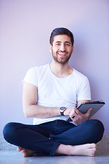 Image showing student working on tablet