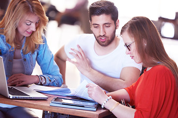 Image showing students group working on school  project  together