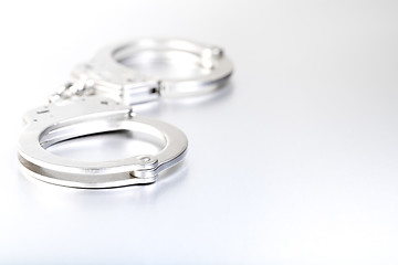 Image showing handcuffs high-key closeup