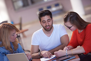 Image showing students group working on school  project  together