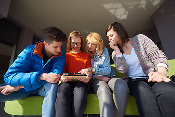 Image showing students group working on school  project  together