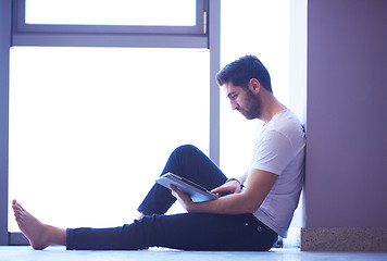 Image showing student working on tablet