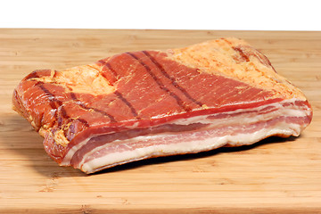 Image showing Bacon on a kitchen Board