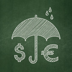 Image showing Privacy concept: Money And Umbrella on chalkboard background